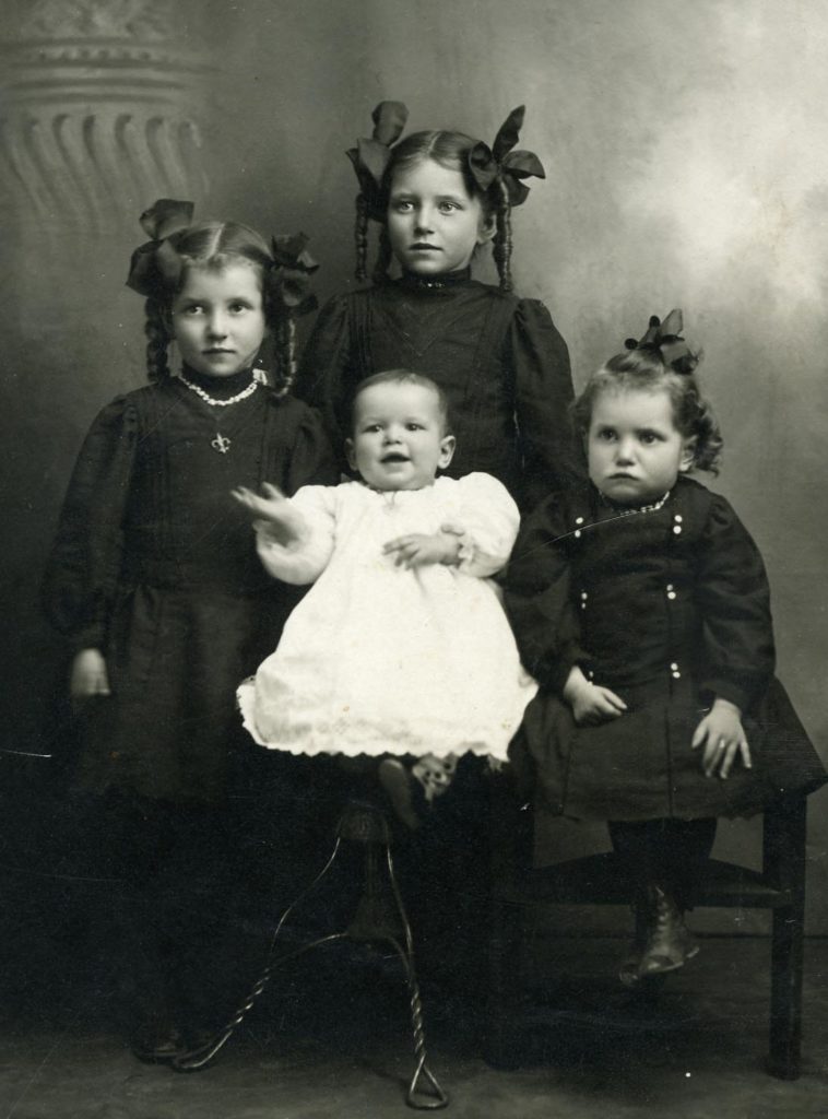 Left to right: Armenia, Naomi and Emma with baby brother, William O. Tolman. They are the children of William Alvin and Hattie Naomi Tolman Tolman, gc of Joshua Alvin and Mary Jane Gorringe and Jaren and Emma Briggs Tolman, ggc of Cyrus and Alice Bracken and Judson and Sarah Lucretia Holbrook Tolman.